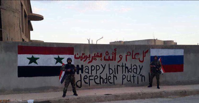 صور.. سوريون يهنئون بوتين بعيد ميلاده 1