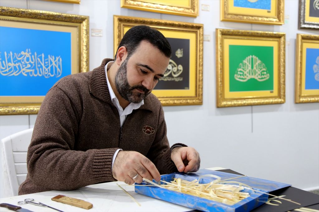 بالصور.. تركي يحول اعواد القمح الى لوحة فنية 7