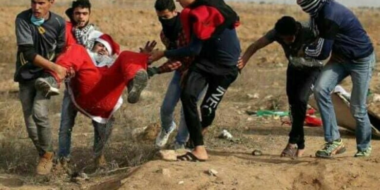 الجيش الإسرائيلي يصيب "بابا نويل" بالرصاص على حدود غزة 1