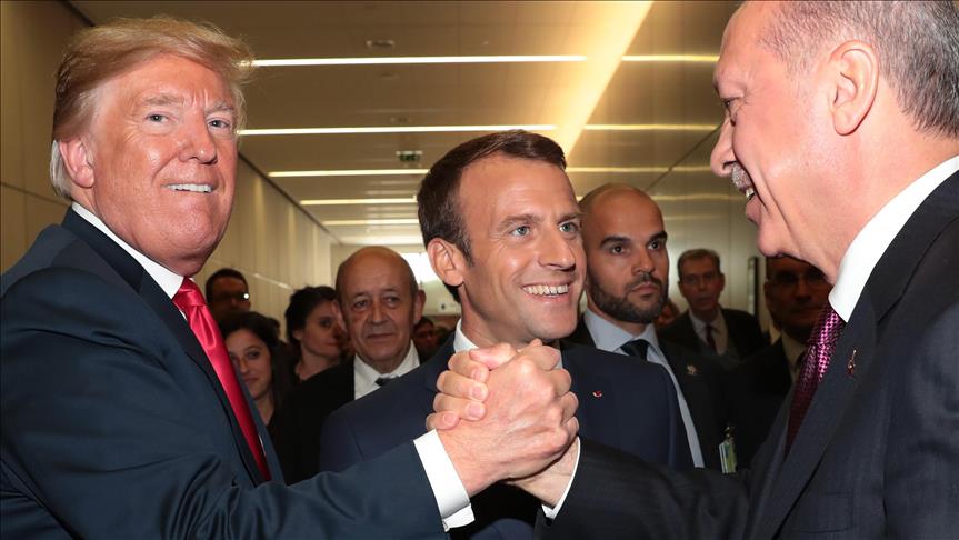 صورة لأردوغان وترامب في بروكسل ثير اهتمام الصحفيين 7