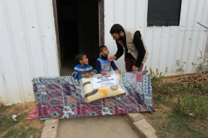 "تاشي" التركية تقدّم مساعدة الشتاء للمحاصرين في قطاع غزة(صور) 1