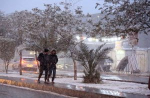 ظاهرة نادرة.. الثلوج تكسو العاصمة العراقية (شاهد)