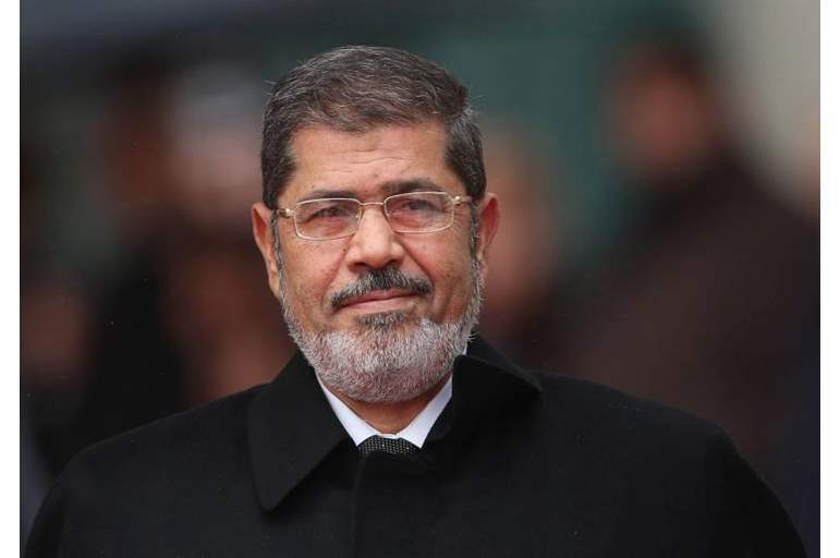 نجل "مرسي" ينشر صورة نادرة لوالده 1