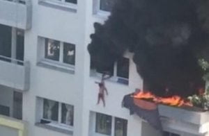 مشهد مروع لقفز طفلين من الطابق الثالث هربا من النيران (فيديو)