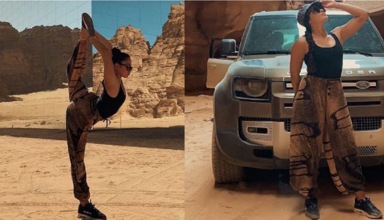 فتاة أجنبية تمارس اليوجا في السعودية بملابس مثيرة !