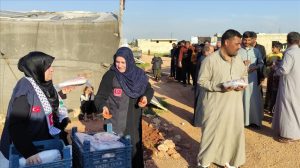 مغتربون أتراك يزرعون البسمة على وجوه أيتام سوريين