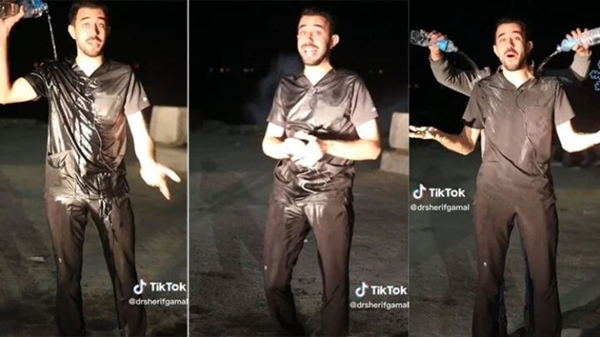 طبيب مصري يستحم وسط الشارع لإثبات نظريته !! 3