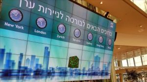 الحرب على غزة تهوي ببورصة تل أبيب والشيكل إلى أدنى مستوى